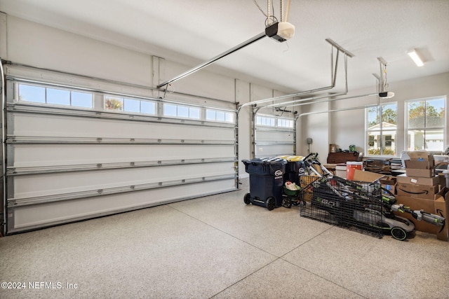 garage featuring a garage door opener