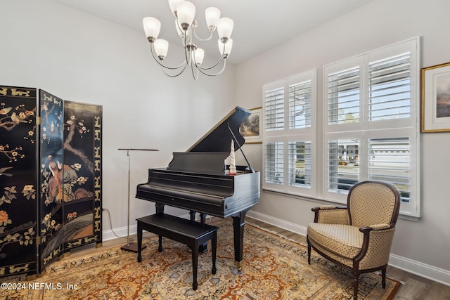 interior space featuring a chandelier and hardwood / wood-style flooring