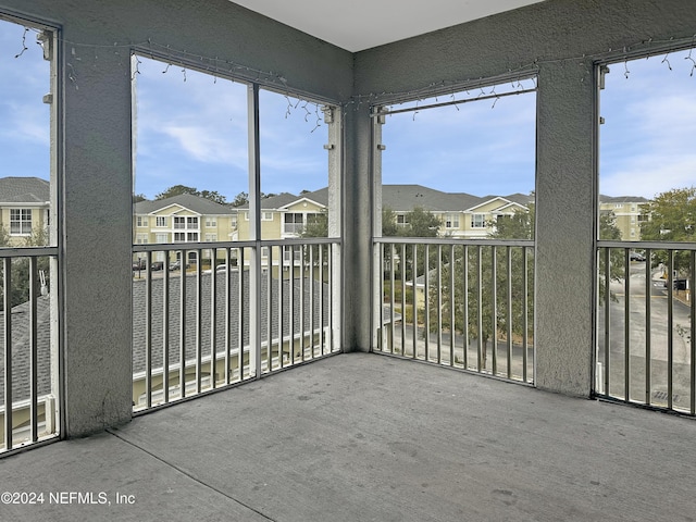 unfurnished sunroom with a healthy amount of sunlight