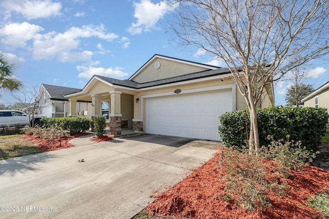 view of front of property with a garage