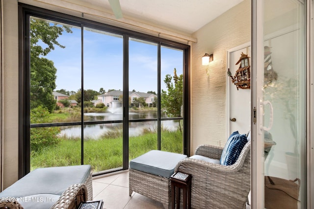 sunroom with a water view