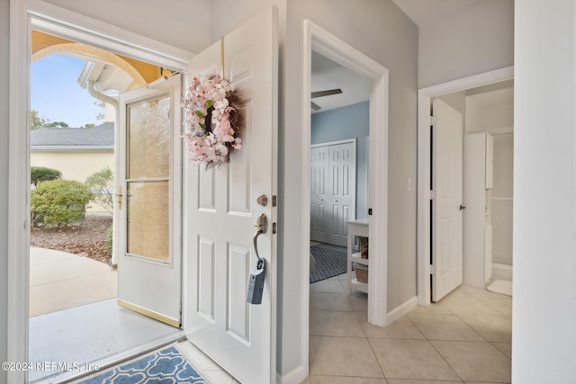 foyer entrance featuring light tile patterned floors