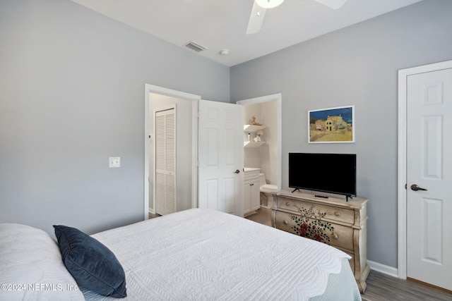 bedroom with wood-type flooring, connected bathroom, and ceiling fan