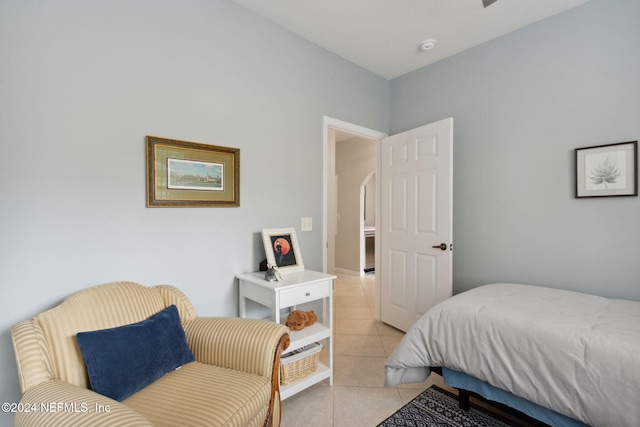 bedroom with light tile patterned flooring