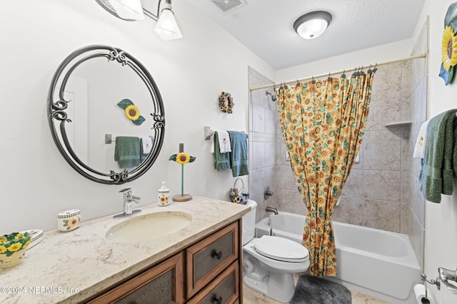 full bathroom featuring shower / bath combo, vanity, a textured ceiling, and toilet