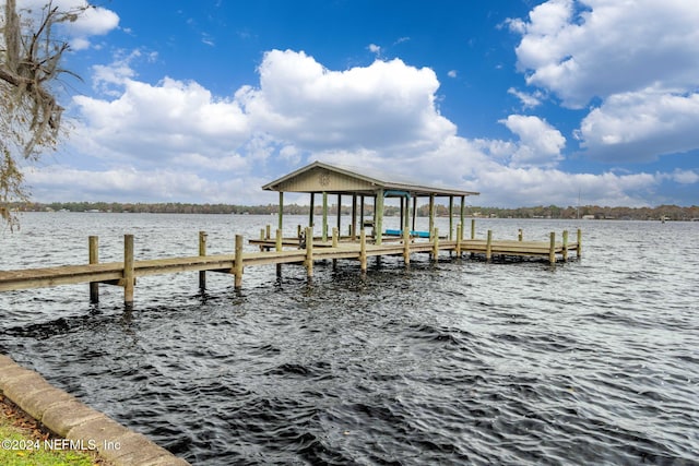 view of dock with a water view