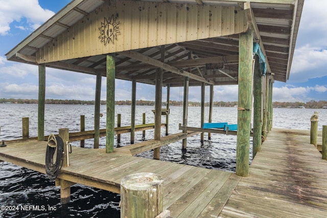 view of dock with a water view