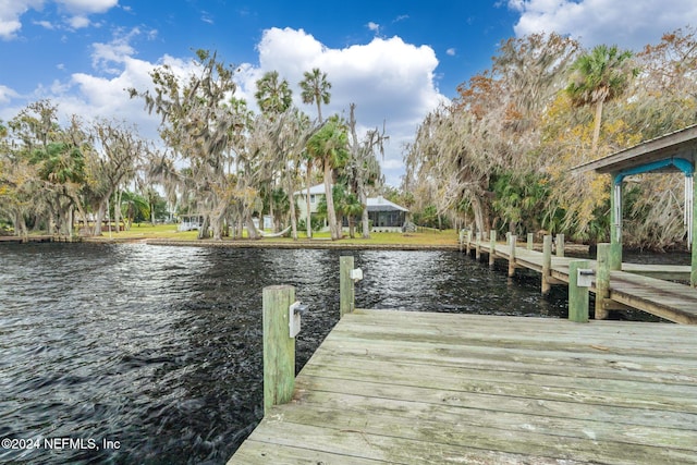 view of dock with a water view