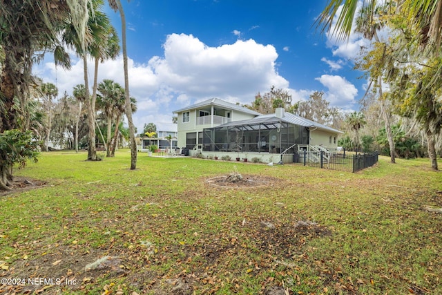 view of yard with a lanai