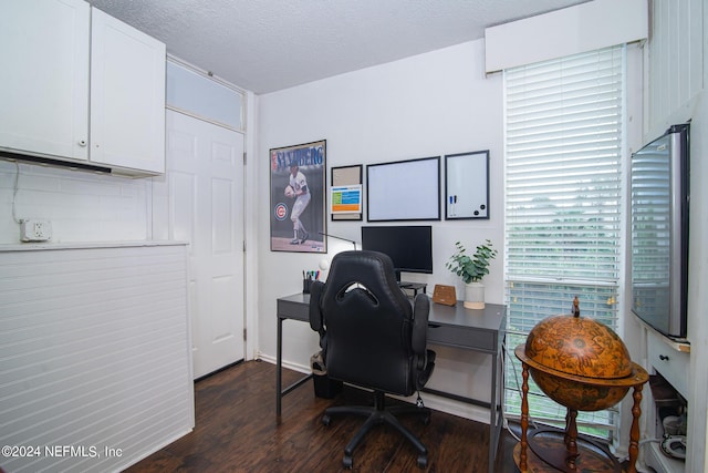 office area featuring dark hardwood / wood-style flooring and a textured ceiling