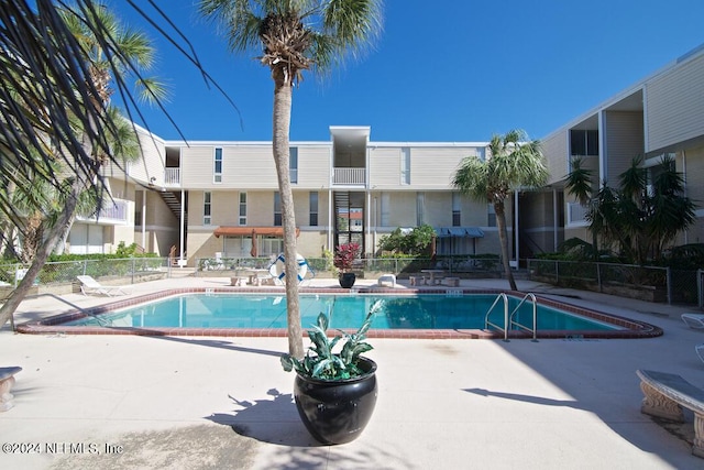 view of pool with a patio area