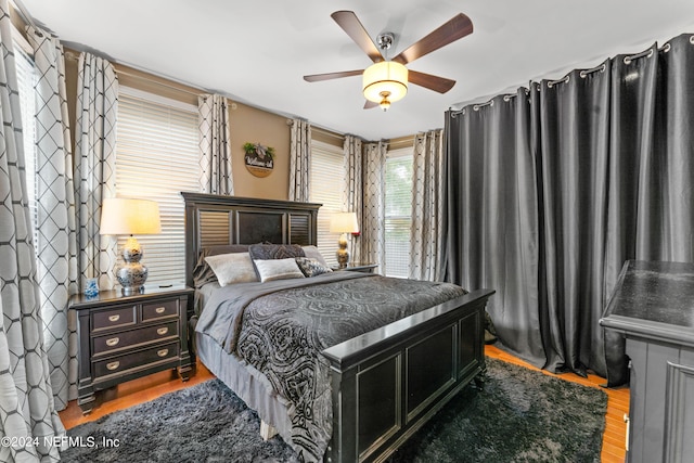 bedroom featuring ceiling fan and light wood-type flooring