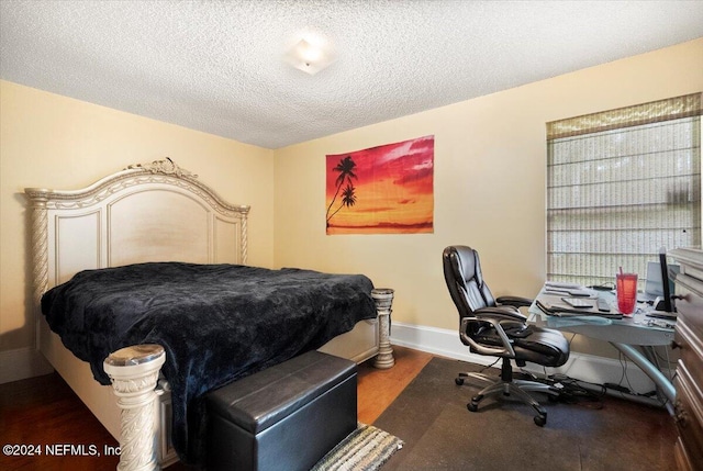 bedroom featuring a textured ceiling