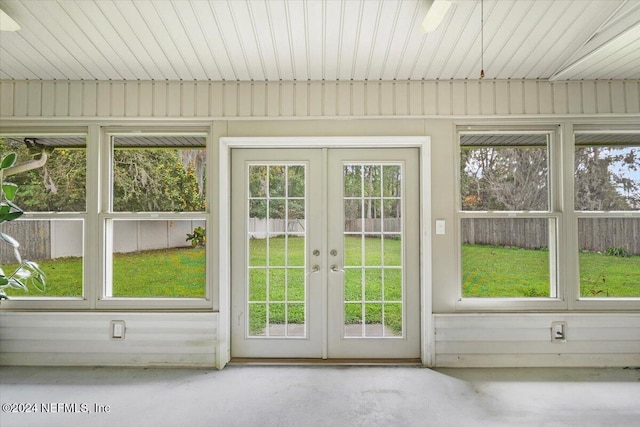 unfurnished sunroom with french doors and plenty of natural light