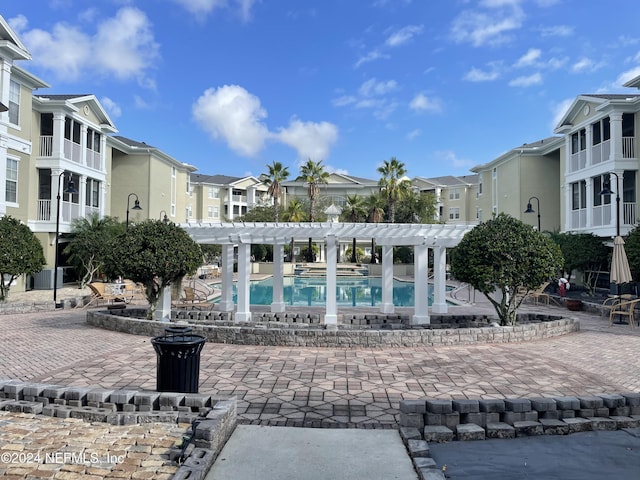 view of pool featuring a pergola