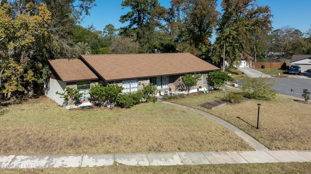 view of front of house with a front lawn