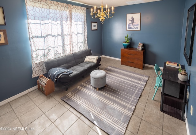 tiled living room featuring a chandelier, a textured ceiling, and a healthy amount of sunlight