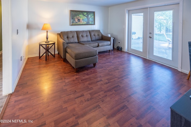 living room featuring french doors and dark hardwood / wood-style flooring