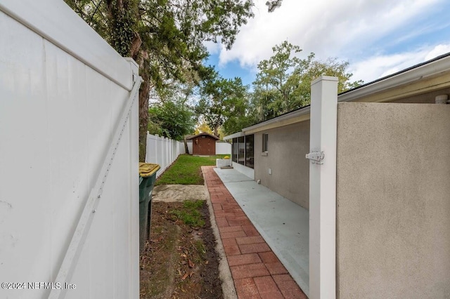 view of property exterior featuring a patio