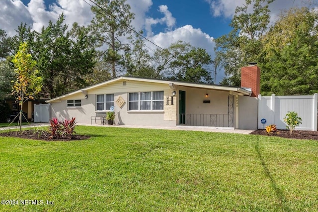 view of front of house with a front yard