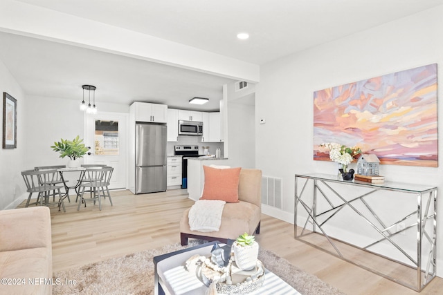 living room featuring light hardwood / wood-style flooring