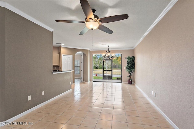 tiled spare room with ceiling fan with notable chandelier and crown molding