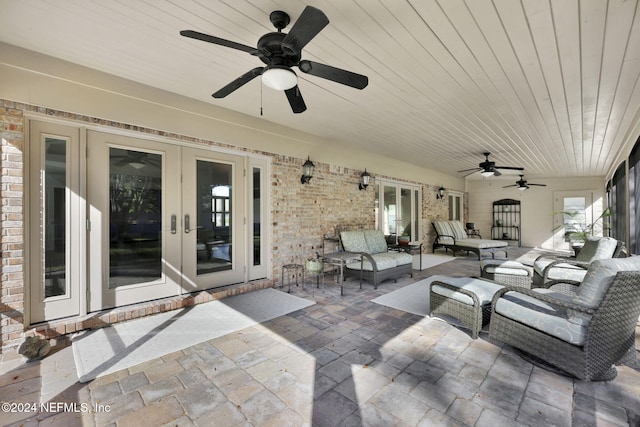 view of patio with outdoor lounge area and french doors