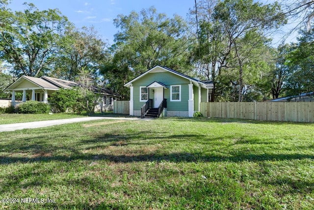 view of front of house with a front lawn