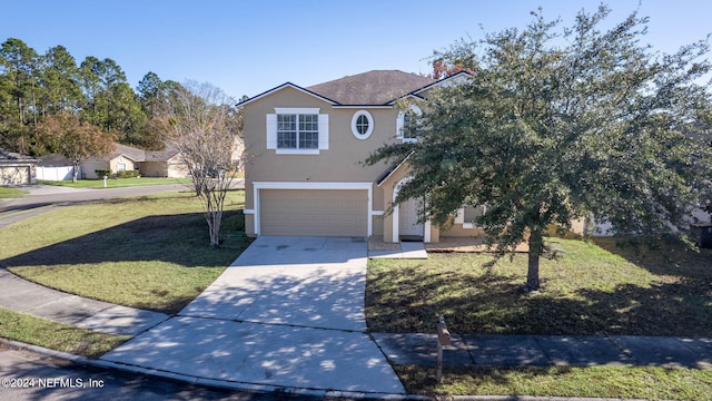 view of front facade featuring a garage and a front yard