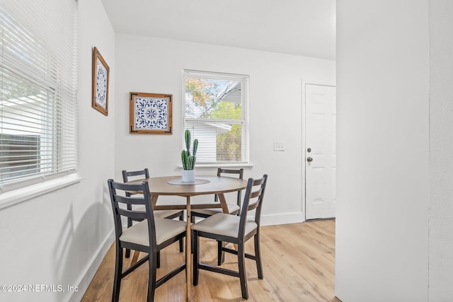 dining space featuring light hardwood / wood-style floors