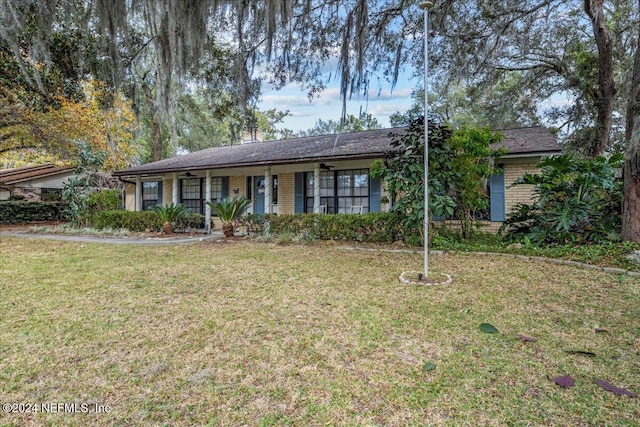 ranch-style house with a front yard