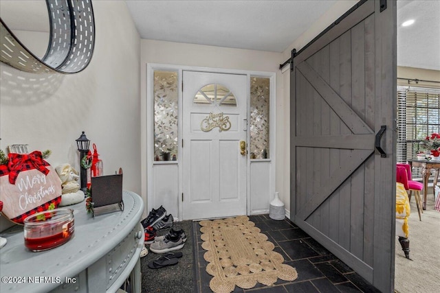 foyer with a barn door