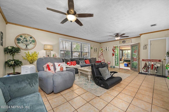 living room featuring crown molding, light tile patterned floors, and a textured ceiling