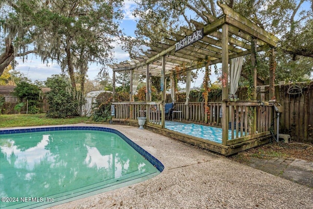 view of pool featuring a patio area and a pergola