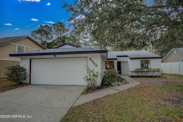 view of front of home featuring a garage