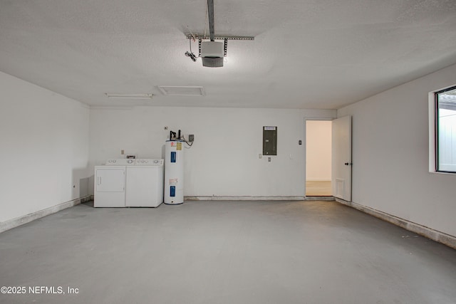 garage with a garage door opener, electric panel, washing machine and clothes dryer, and electric water heater