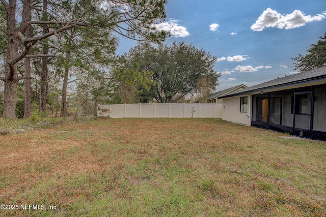 view of yard with fence