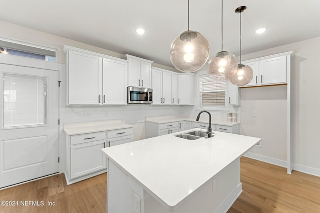 kitchen with white cabinets and sink