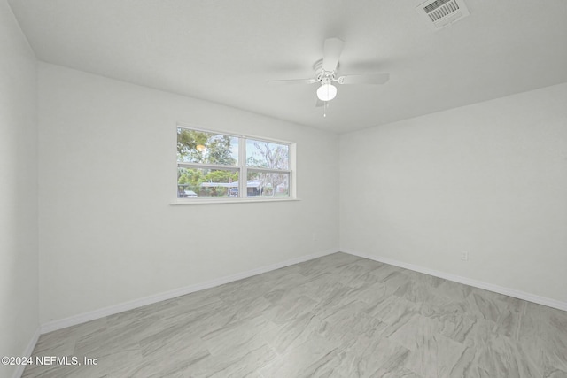 empty room with ceiling fan