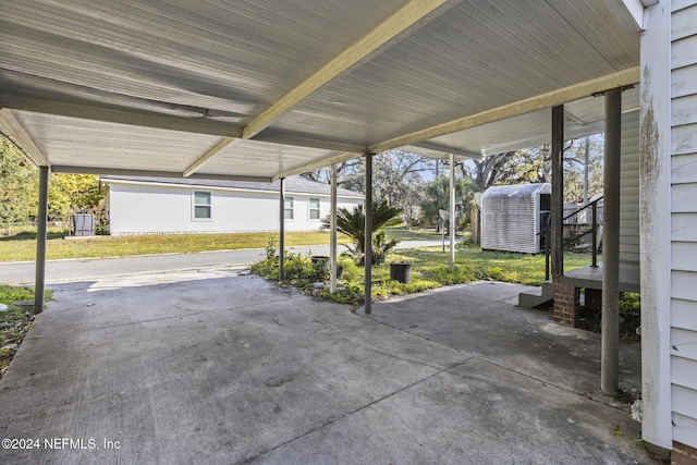 view of patio / terrace featuring a carport