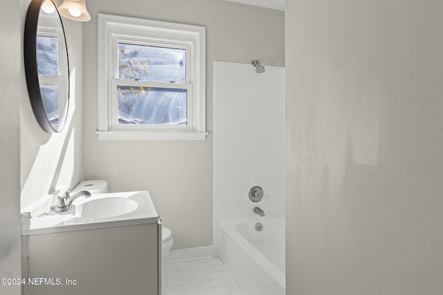 full bathroom featuring vanity, toilet, and tiled shower / bath