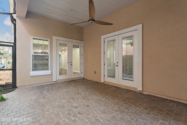 interior space featuring ceiling fan, a lanai, and french doors