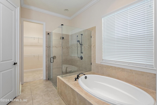 bathroom with separate shower and tub, tile patterned floors, and crown molding