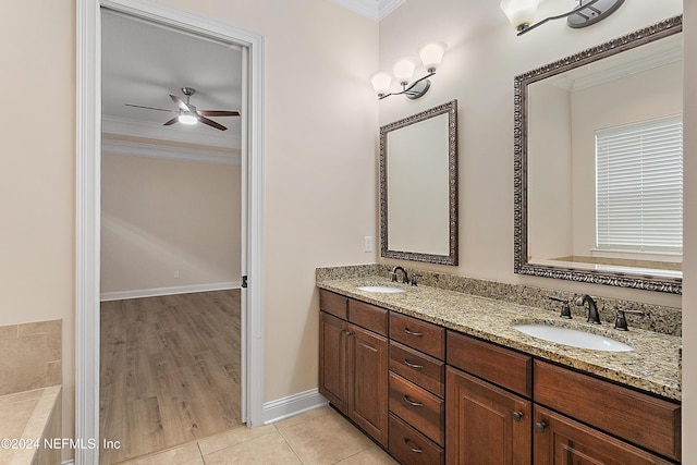 bathroom featuring vanity, crown molding, ceiling fan, and wood-type flooring