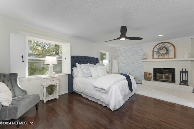 bedroom featuring dark hardwood / wood-style flooring, multiple windows, ornamental molding, and ceiling fan