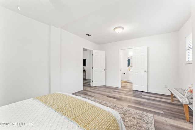 bedroom featuring hardwood / wood-style flooring