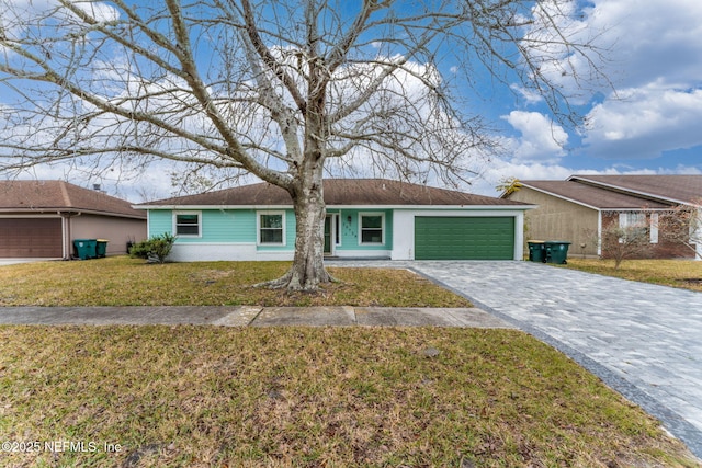 single story home with a garage and a front lawn