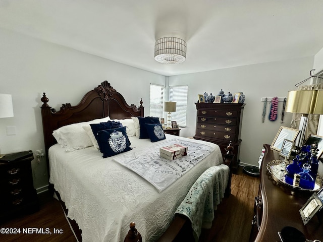 bedroom featuring dark hardwood / wood-style floors