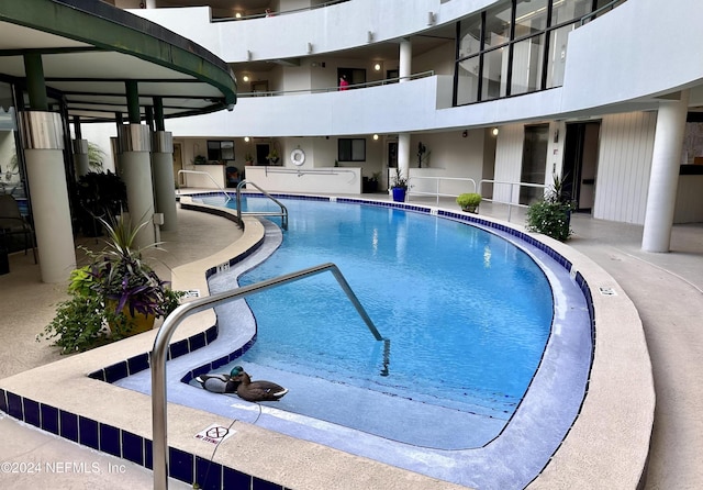 view of pool with a patio area