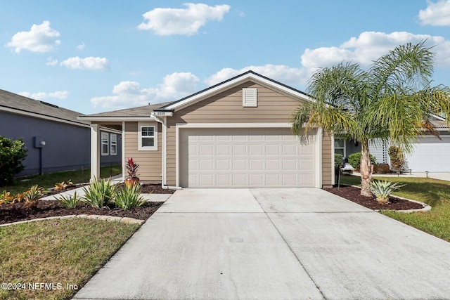 ranch-style home featuring a garage